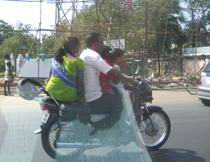 Family of 4 on a 2 wheeler